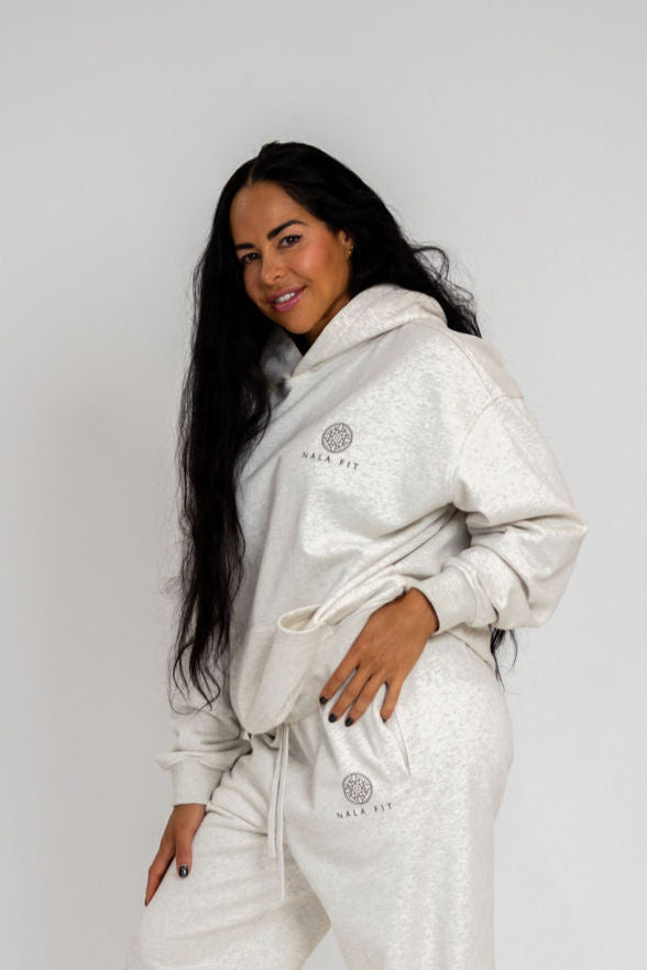 Sahara Hoodie - Desert Sand 
80% cotton, 20% polyester
440gsm cotton 
Made in China 
Hand wash
Pull-on styling
Attached hood with front and back printed logo 
Front pocket 
Oversized weighted  jersey fabric